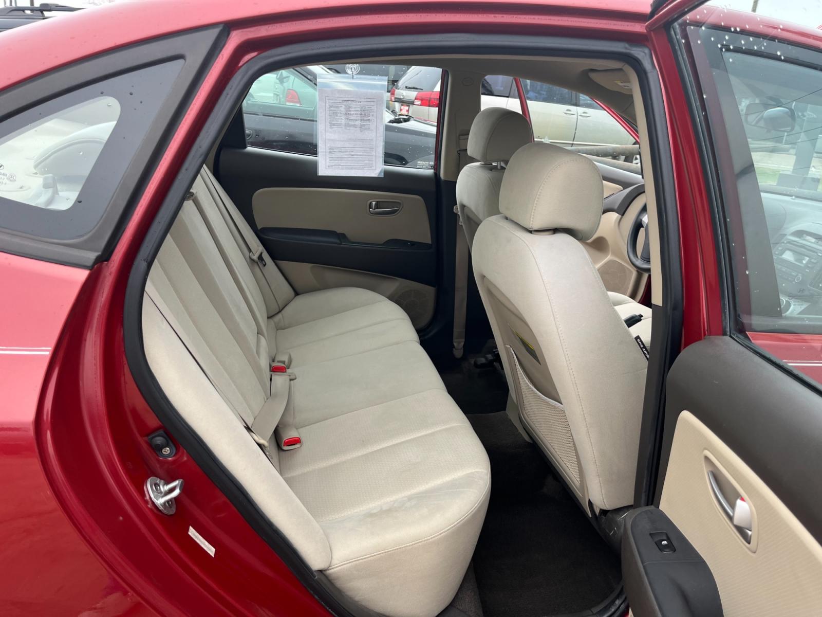 2008 red /TAN Hyundai Elantra GLS (KMHDU46D78U) with an 2.0L L4 DOHC 16V engine, Manual transmission, located at 14700 Tomball Parkway 249, Houston, TX, 77086, (281) 444-2200, 29.928619, -95.504074 - Photo #12